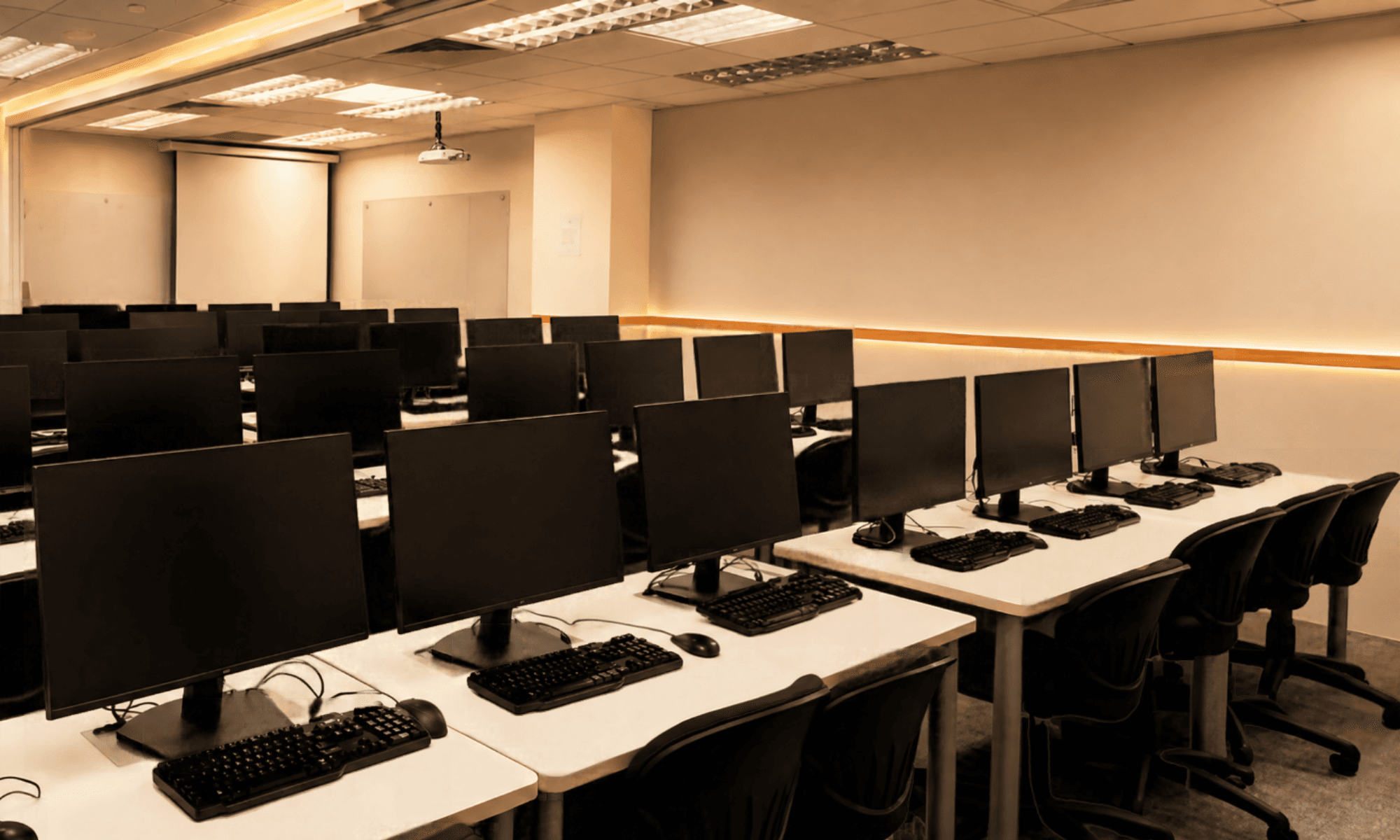 Tech Training Room with rows of desktop computers